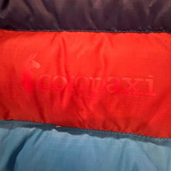 Cotopaxi Woman’s Puffer Jacket in Blue with Orange and Light Blue Accents - Picture 5 of 5